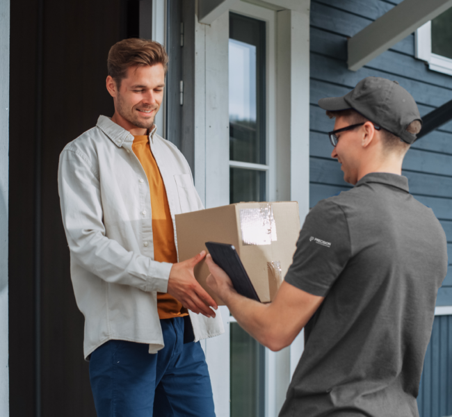 ASL Employee Delivering Package